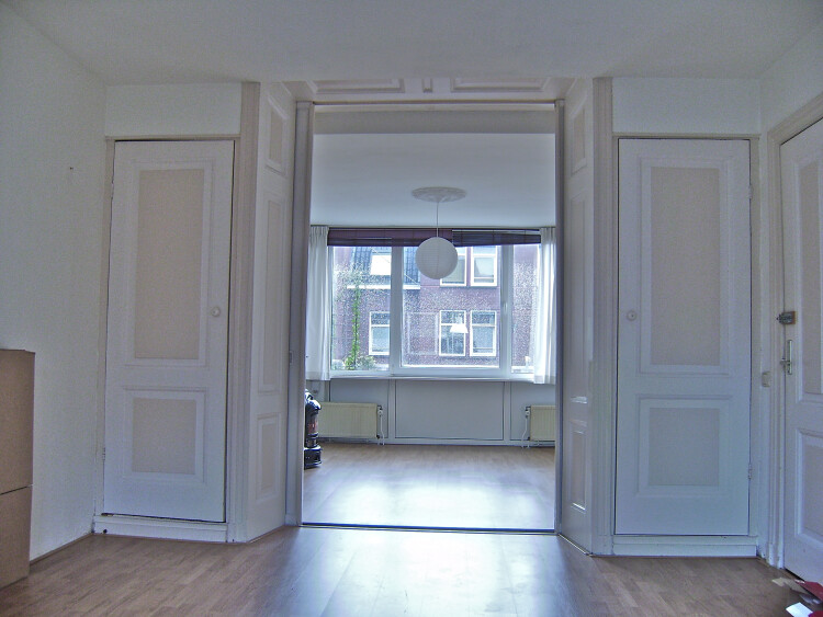 houten schuideuren voor en achter kamer 